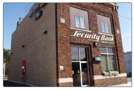 The Security Bank Minnesota branch in Emmons, a brick corner storefront on Main Street